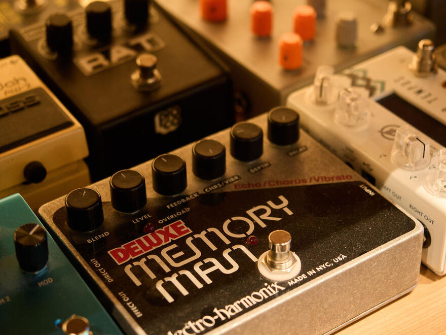 Electro-Harmonix Memory Man effects pedal among other studio equipment. Electro-Harmonix Memory Man effects pedal among other studio equipment.