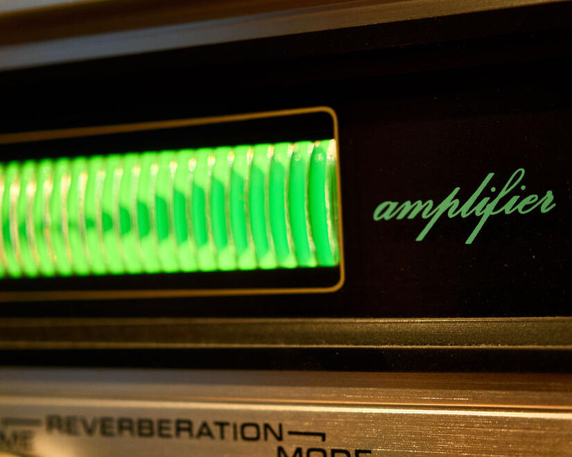 Green illuminated display on a vintage amplifier and reverberation unit. Green illuminated display on a vintage amplifier and reverberation unit.